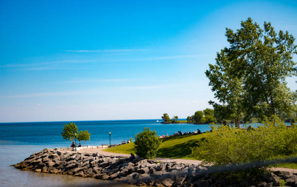 istock Waterfront Park with Boardwalk and Running Path in the Summer 1135353932