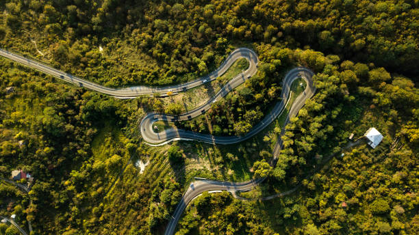 istock Winding road in the mountains top view 1135354217
