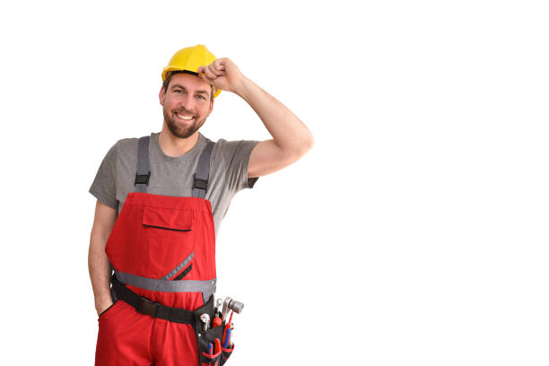 istock cheerful construction worker - craftsman in work clothes on white background - insulated 1135355784