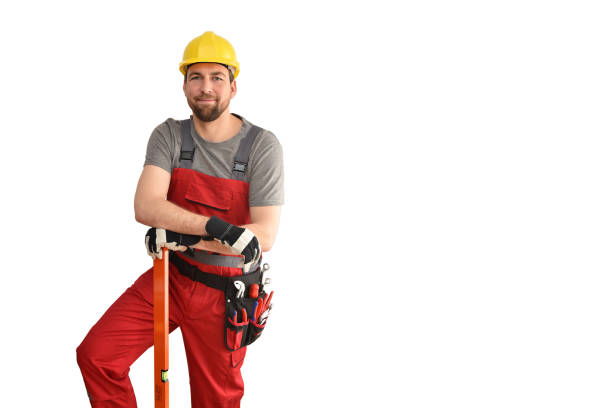 istock cheerful construction worker - craftsman in working clothes with a spirit level on white background 1135355837