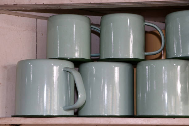 istock Zinc cup in green-colored. put upside down and stacked in layers. 1135356725