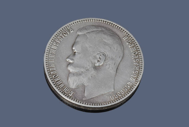 istock Old regal Russian silver ruble coin on gray background 1135356797