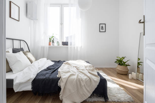 istock Minimalist bedroom in white 1135356844