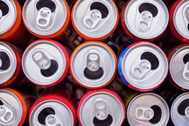 istock Empty aluminium drink cans recycling background concept, top view closeup 1135358552