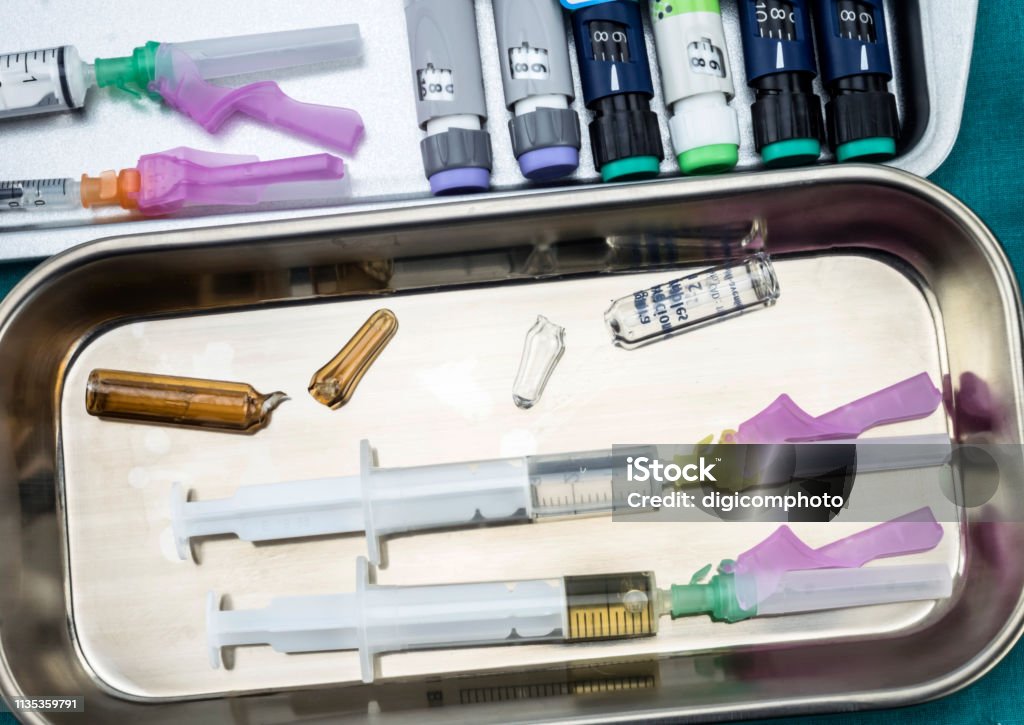 Diverse medication for parenteral use prepared to supply in a hospital, conceptual image, horizontal composition Ampoule Stock Photo