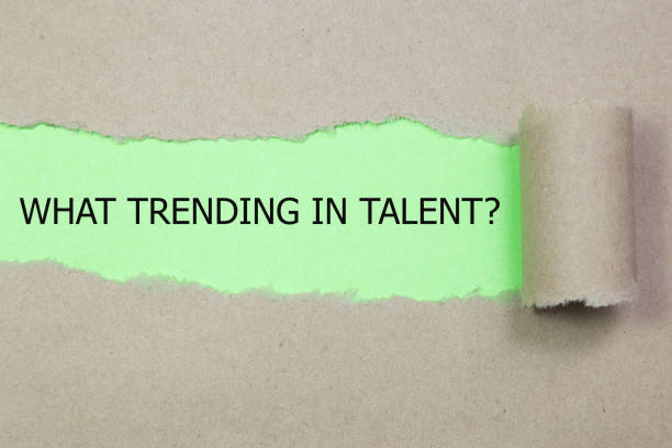 istock WHAT TRENDING IN TALENT? question written under torn paper. - Image 1135361955