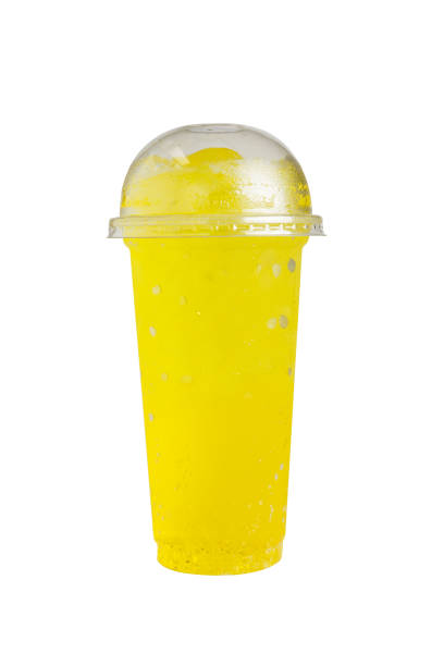 istock Isolated Front View of Iced Pineapple Drink in plastic cup with plastic cap. Studio shot. 1135363297