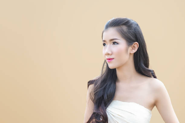 istock beautiful asian woman smiling 1135368081