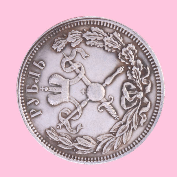 istock ruble coin isolated on pink background 1135368416