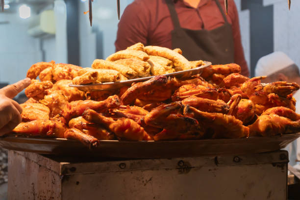 istock Chicken seekh kababs are being prepared road side 1135368948