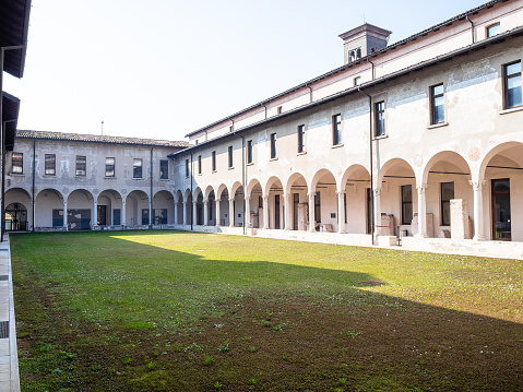 Brescia, Italy - February 21, 2019: outdoor cloister in Monastery of Santa Giulia in Brescia. Santa Giulia inscribed on the List of World Heritage of UNESCO as Longobards in Italy, Places of the power