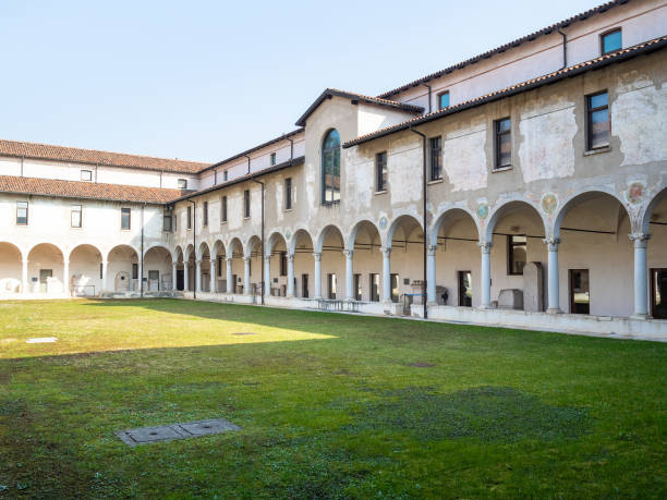 green cloister in Monastery of Santa Giulia Brescia, Italy - February 21, 2019: green cloister in Monastery of Santa Giulia in Brescia. Santa Giulia inscribed on the List of World Heritage of UNESCO as Longobards in Italy, Places of the power brescia stock pictures, royalty-free photos & images