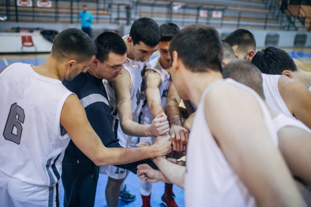 istock Coach and basketball players 1135374139