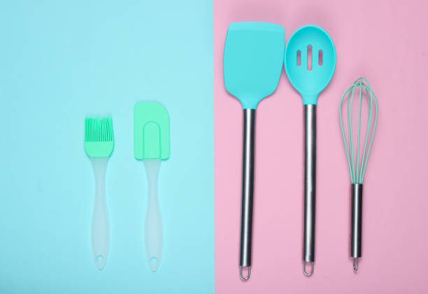 istock Kitchen utensils set : culinary brush, whisk, spatula on background. Top view, minimalism 1135375129