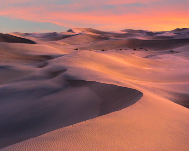 istock Sunset Over Mesquite Dunes in Death Valley, CA 1135376026