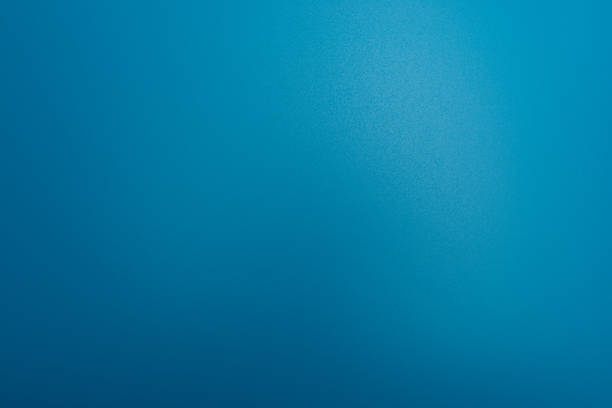 istock Texture in a bright, blue color illuminated with a delicate light. 1135377517