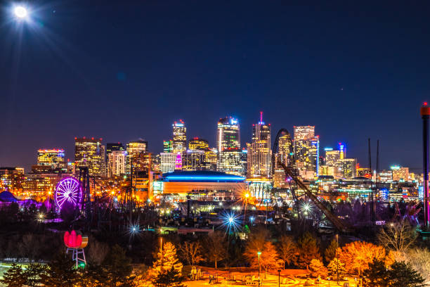 This was a collection of long exposures that I took with a full moon shining down on the downtown Denver skyline in Colorado