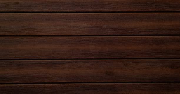 istock brown wood texture, dark wooden abstract background 1135379327