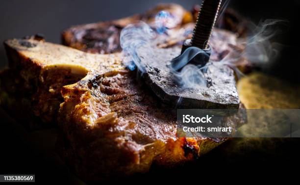 Ready Tbone Â  Steak On Which Burns The Stigma Of The Logo Stock Photo - Download Image Now