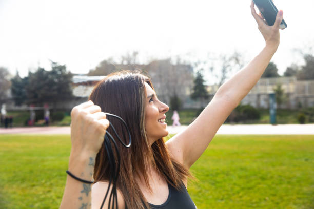 istock An attractive female runner taking selfie outside. – Image 1135380763