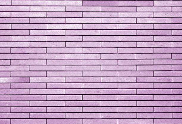 The color of 2022 is very peri. Purple new brick wall pattern background for architectural design, front view or top view. Space for copying.