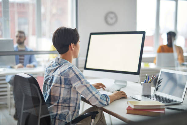 istock Working in front of monitor 1135382774