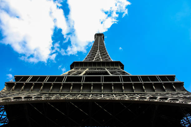istock Tour Eiffel symmetric shot with clods in the sky 1135383569