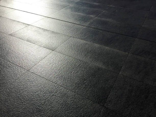 istock Wet outdoor tiled floor with sunlight 1135383684