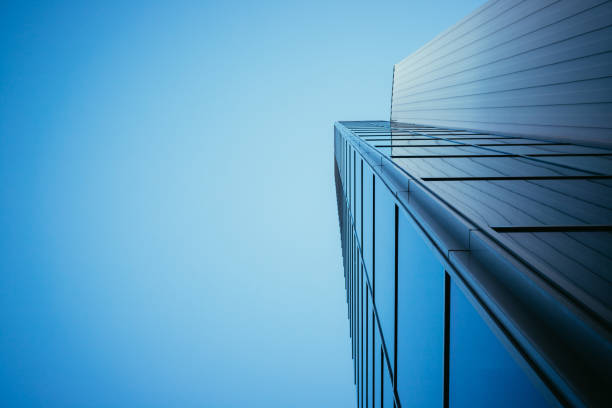 istock Blue skyscraper out of glass 1135384026