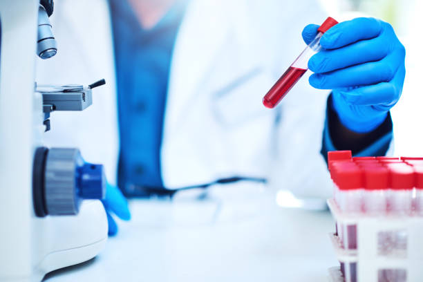 Let's get a closer look at this sample Closeup shot of a scientist analyzing samples in a laboratory biochemist photos stock pictures, royalty-free photos & images