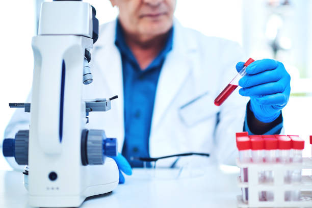 Every sample has a big story to tell Closeup shot of a scientist analyzing samples in a laboratory biochemist stock pictures, royalty-free photos & images