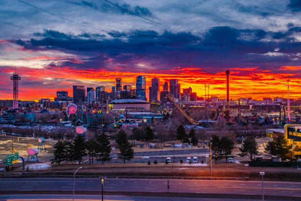 Colorful Sunrise Over Downtown Denver Skyline in Colorado stock photo