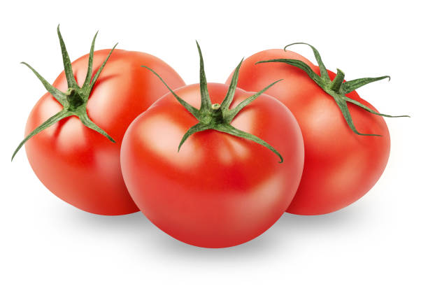 istock Isolated tomato. Three whole fresh tomatoes isolated on white background, with clipping path 1135386523