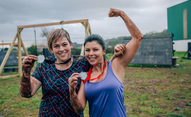 istock Athletes showing medals after race 1135386672