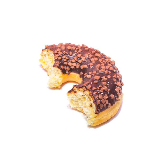 istock Half of chocolate donut on white background 1135388281