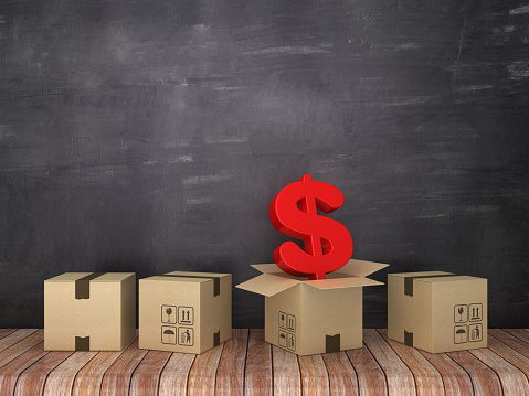 Cardboard Boxes with Dollar Sign on Wood Floor - Chalkboard Background - 3D Rendering
