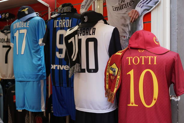 Rome, Italy - August 10, 2018: Unofficial merchandise t-shirts of the professional Italian football clubs AS Roma, SS Lazio, Inter and Juventus