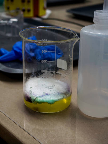 istock Cosmetic chemicals ingredient in bulb on laboratory table, gloves 1135393091