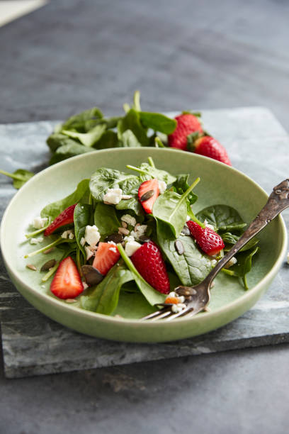 istock Spinach with strawberries and feta 1135397396
