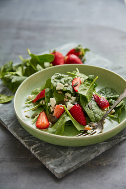 istock Spinach with strawberries and feta 1135397972