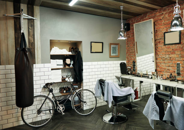 istock Modern empty barbershop interior with chairs, mirrors and lamps 1135398019