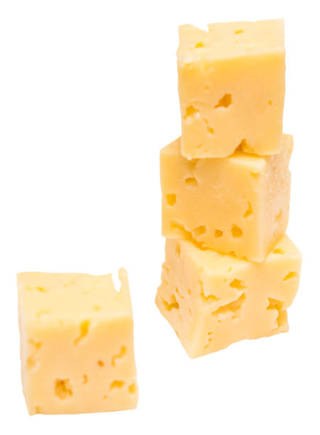 istock Cube of cheese isolated on a white background 1135399673