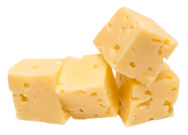 istock Cube of cheese isolated on a white background 1135399678