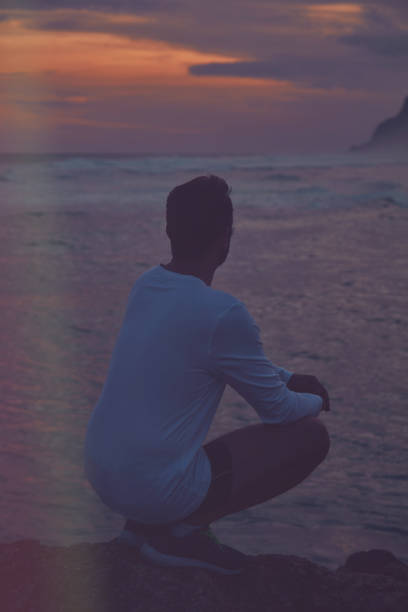 istock Man enjoying on the beach. 1135406359