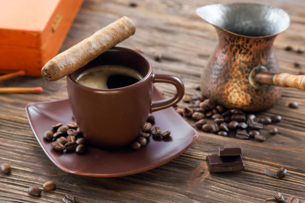istock Cigar, chocolate and a cup of black coffee 1135407081