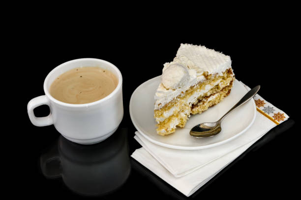 istock Piece of tasty cake and coffee with reflection 1135408170