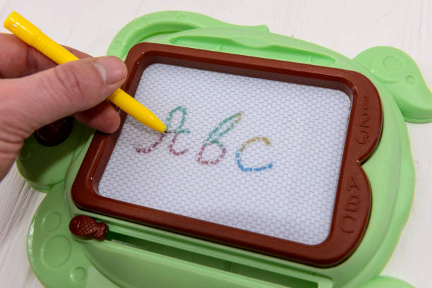 istock Colorful child toy for writing at light background 1135410540