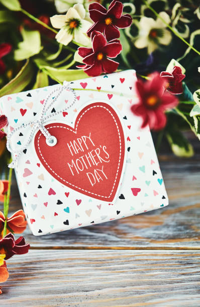 istock Mother's Day gift with flowers 1135411035