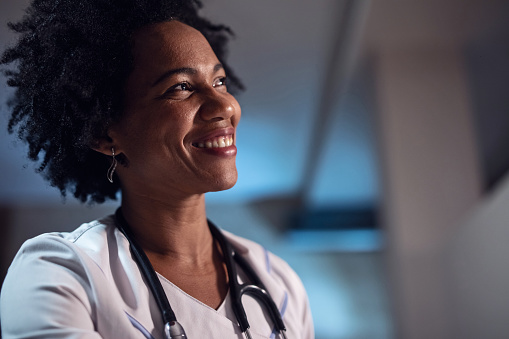 Portrait of smiling black female doctor.