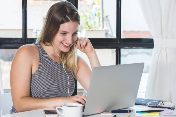 istock Woman working on laptop at home. 1135414893